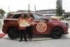 Banks DIH Ltd presents grand prize in “Crown the Road” promotion