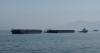 Iran warns that it will forcibly maintain control of Hormuz amid a wave of bombings over Qatar, Oman, and Bahrain