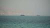 Iran declares Strait of Hormuz closed as 'unauthorized' vessel hit