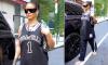Rihanna supports Jay-Z with her jersey as she heads to his Yankee Stadium concert amid performance rumors