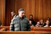 Zimbabwean-born UK fugitive accused of murdering wife and daughters appears in Johannesburg court