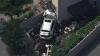 2 in custody after SUV crashes through fence, front of house on Staten Island