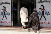 'Everything is fine in Herat': Taliban says 'no oppression' of Afghan women after dress crackdown