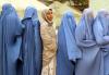Women ‘gripped by fear’ as Taliban cracks down on dress code in Afghan city