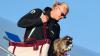 Fans ‘even more in love’ with Erling Haaland as World Cup hero carries £560 STUFFED RACCOON off plane back in Norway