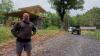 Arkansas man sells his store, buys roadless mountain land, and builds an off-grid home