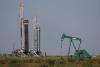 Texas oil firms increase production amidst elevated prices during U.S.-Iran War
