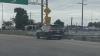 New Orleans driver hospitalized after car crashes, overturns on train tracks