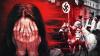 Polish politician throws ‘Hitler’ Zelensky portrait in trash (VIDEO)