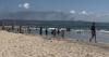 'Just chill': Tyre beachgoers sunbathe against backdrop of smoke and occupation