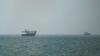 Iran and US stage new attacks, battle over Hormuz strait