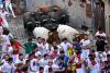 Local tradition: 57 gored or bruised during Spain's San Fermin bull runs