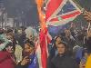 Shocking moment Argentina fans BURN Union Jacks in the street as World Cup semi final tensions reach fever pitch
