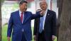 U.S. scientist held in China for nearly 2 years, family reveals, in a case Trump has raised with Xi