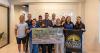 TurnKey Solutions supports SCC's scholarship golf tourney with $10,000 hole-in-one prize