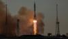 Russia sends American and two cosmonauts to space station