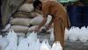Karachi traders, grinding mill owners agree to cut flour price by Rs8 per kg