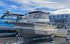 Stolen Napier boat Mighty Pelican found more than 100km from marina, surrounded by cannabis plants and guns
