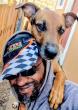 Journey home postponed, but hope remains for Malawian man Singhini and loyal dog Fireman