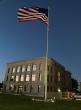 Lamar Lions Club flag in front of Prowers Courthouse gets a “glam-up” with lighting and preparations for memorial bricks