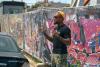Keep artists in Baltimore by using construction sites as canvases