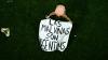 Argentina players celebrate with banned political banner after win