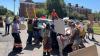 Protesters surround Tim Houston's car, windshield smashed after speech