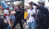 Aggro on the streets: Armed police arrest England and Argentina fans in Atlanta as fans cause chaos in London following Three Lions' loss