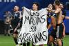 Britain slams Argentina players for brandishing Falklands flag amid calls for Premier League stars to be denied visas