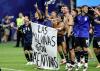Argentine players brandish political Falklands flag after England match at World Cup