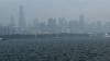 Smoke from wildfires blanket Chicago area, with skyline disappearing under hazy skies