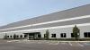 Shipping giant to open its largest Mass. site, bringing 1,000 new jobs