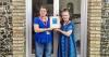 Volunteer 'amazed' to find print worth thousands in charity donation