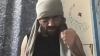 Afghan migrant with AK47 face tattoo films TikToks illegally in cell after being jailed for Nigel Farage death threats