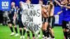 UK urges FIFA to act after Argentine players hold up Falklands banner