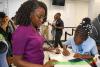 ASPIRE STUDENTS STEP INTO BANKING WORLD AS PM DREW MATCHES DEPOSITS UP TO EC$200