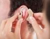 Trans-tympanic optical stimulation of the cochlea evokes reliable auditory responses