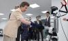 Amused Princess Anne shakes hands with robot during activity-packed South Korea visit as royal fans joke 'but can it curtsy?'