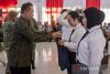 Minister touts Red and White Coop as village service hubs