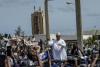 Ex-president Sall arrives back in Senegal for meeting with su