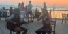 Musical duo gives waterfront performance