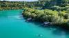 The turquoise lake with stunning 'water bungalows' like the Maldives less than 1 hour from London