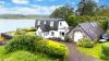 'Spectacular' loch shore Highland property with small Isles view goes up for sale