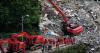 China landslide: Rescuers search for 34 missing, 8 dead
