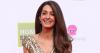 Amal Clooney’s Vintage Mugler Fringe Top Hangs by a Single Strap in Italy