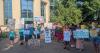 School supporters protest plans to remove church status