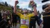 Pogacar launches late attack to win 14th stage, build on Tour de France lead