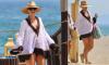 Pregnant Vogue Williams covers her blossoming bump in floaty beach cover up as she continues relaxing on Spanish family holiday after revealing her pregnancy workout regime