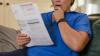 Kansas woman sees $300 vanish, then learns hospital garnished wages despite qualifying for free care