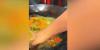 Restaurant chef leaves viewers stunned by stirring boiling oil with unprotected hand